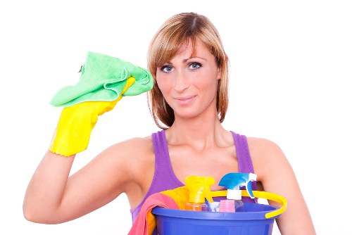 Mattress cleaning service preparing a bed for deep cleaning