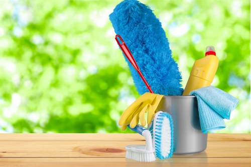 Technician cleaning fabric upholstery with specialized tools